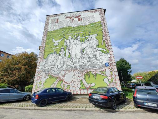 Nowy Sącz. Mural upamiętniający artystę Jana Bukowskiego